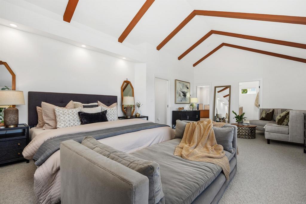 602 Sereno View Road Encinitas, CA 92024 - Photo 13 of 34 a bed room with a bed and a couch