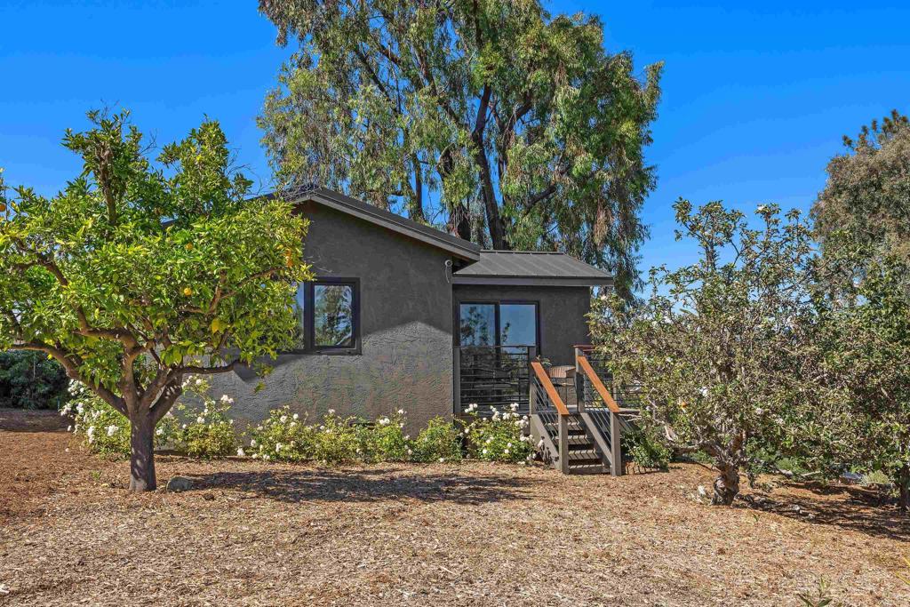 602 Sereno View Road Encinitas, CA 92024 - Photo 26 of 34 a front view of a house with garden