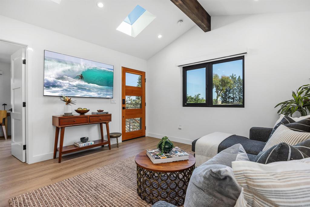 602 Sereno View Road Encinitas, CA 92024 - Photo 28 of 34 a living room with furniture and a wooden floor