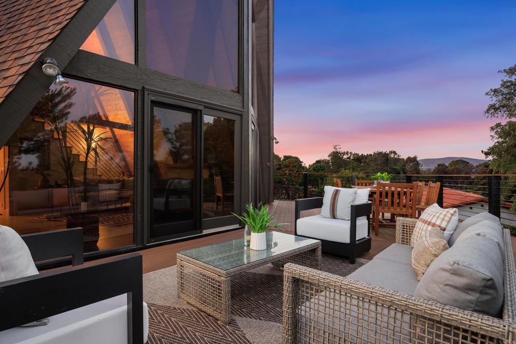 602 Sereno View Road Encinitas, CA 92024 - Photo 34 of 34 a view of a roof deck with couches and potted plants