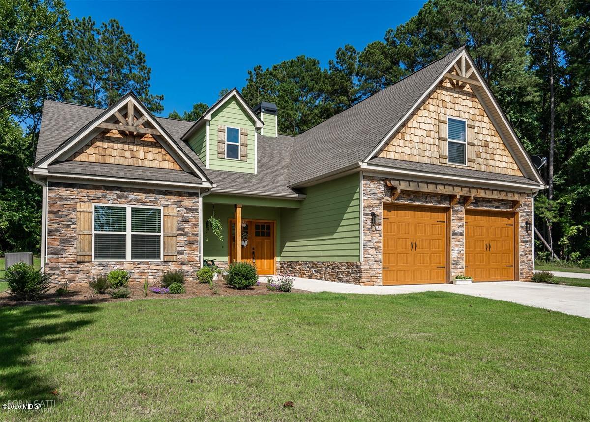 826 Holly Ridge Drive Gray, GA 31032 - Photo 2 of 28 front view of a house with a yard