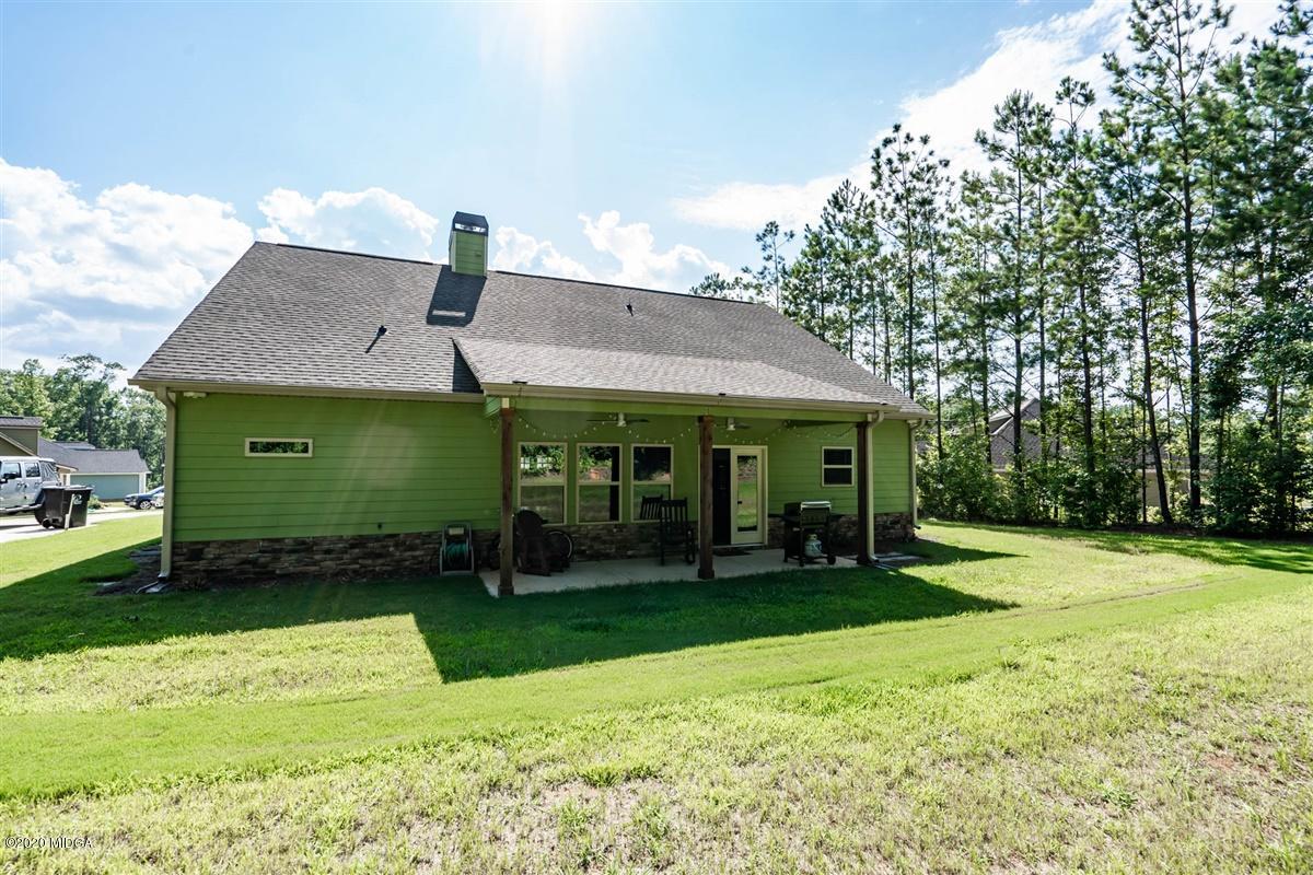 826 Holly Ridge Drive Gray, GA 31032 - Photo 28 of 28 a view of a house with garden