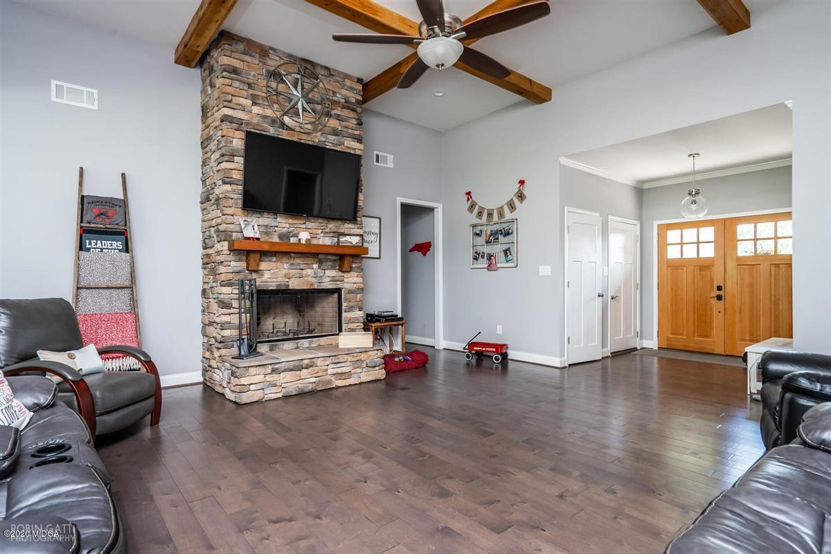 826 Holly Ridge Drive Gray, GA 31032 - Photo 7 of 28 a view of living room with furniture and a fireplace