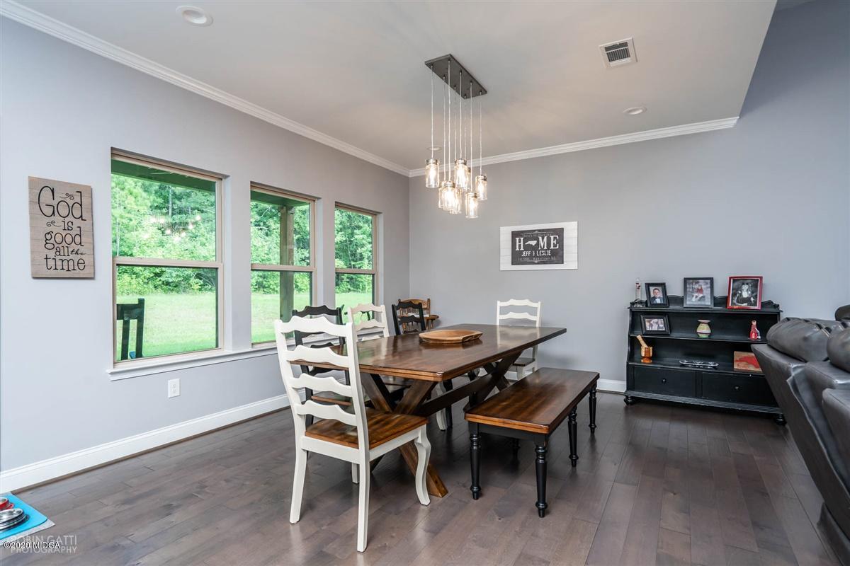 826 Holly Ridge Drive Gray, GA 31032 - Photo 8 of 28 a view of a dining room with furniture window and outside view