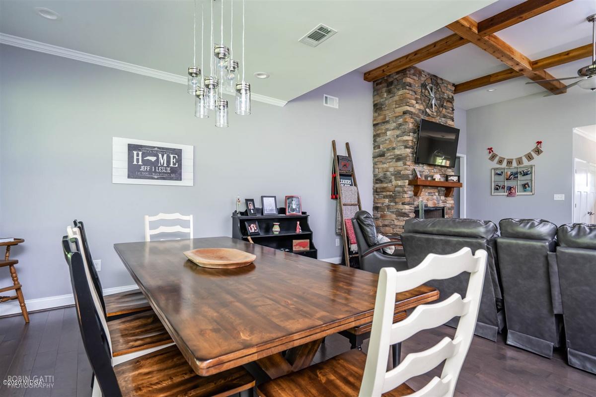 826 Holly Ridge Drive Gray, GA 31032 - Photo 9 of 28 a view of a dining room with furniture