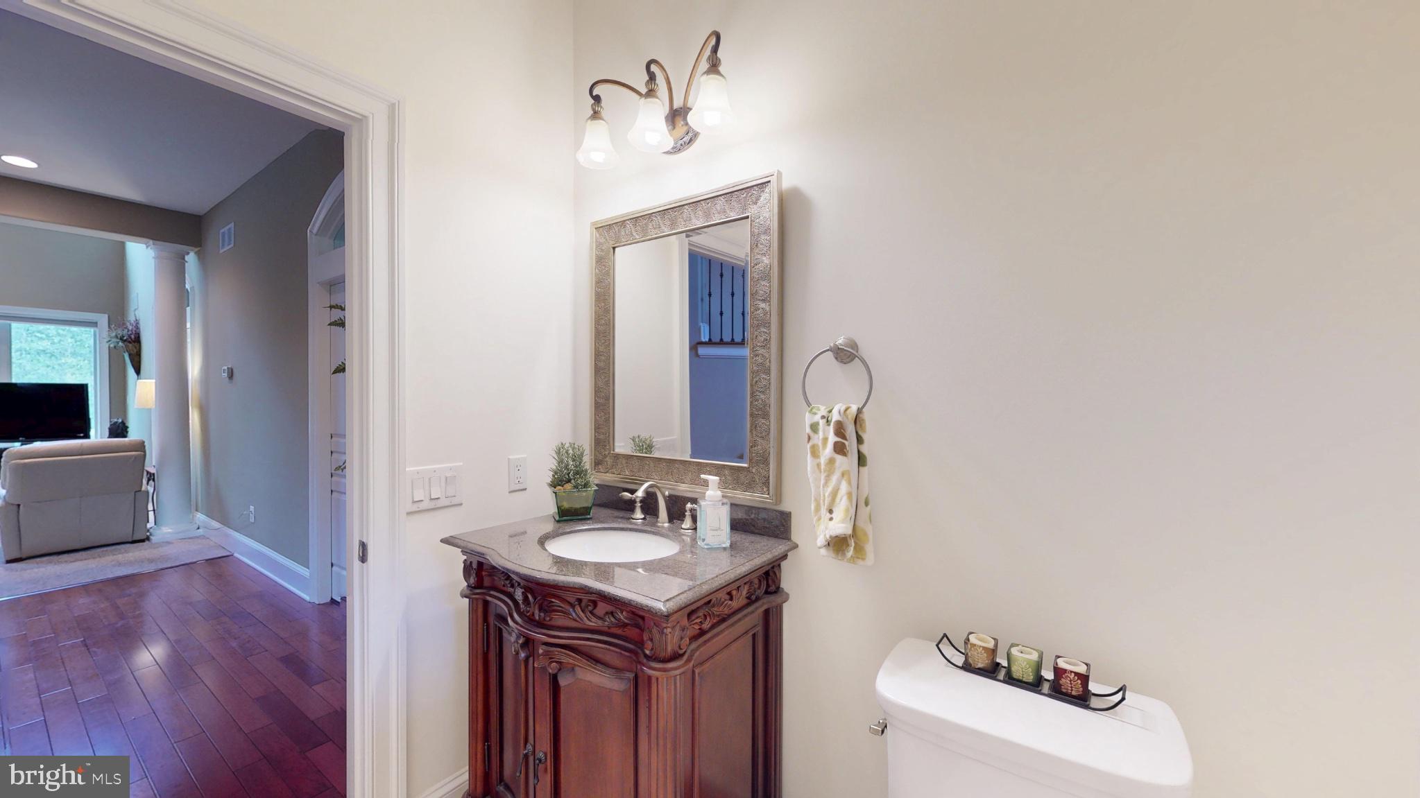 309 Ark Road Mount Laurel, NJ 08054 - Photo 17 of 60 a en suite bathroom with a sink and a mirror
