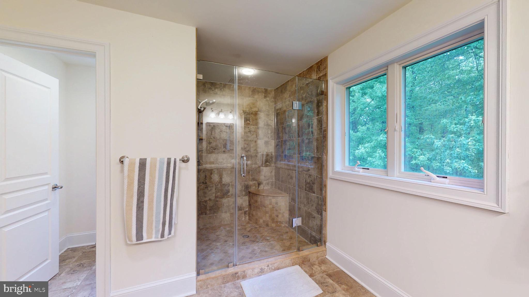 309 Ark Road Mount Laurel, NJ 08054 - Photo 33 of 60 a bathroom with a shower and a toilet