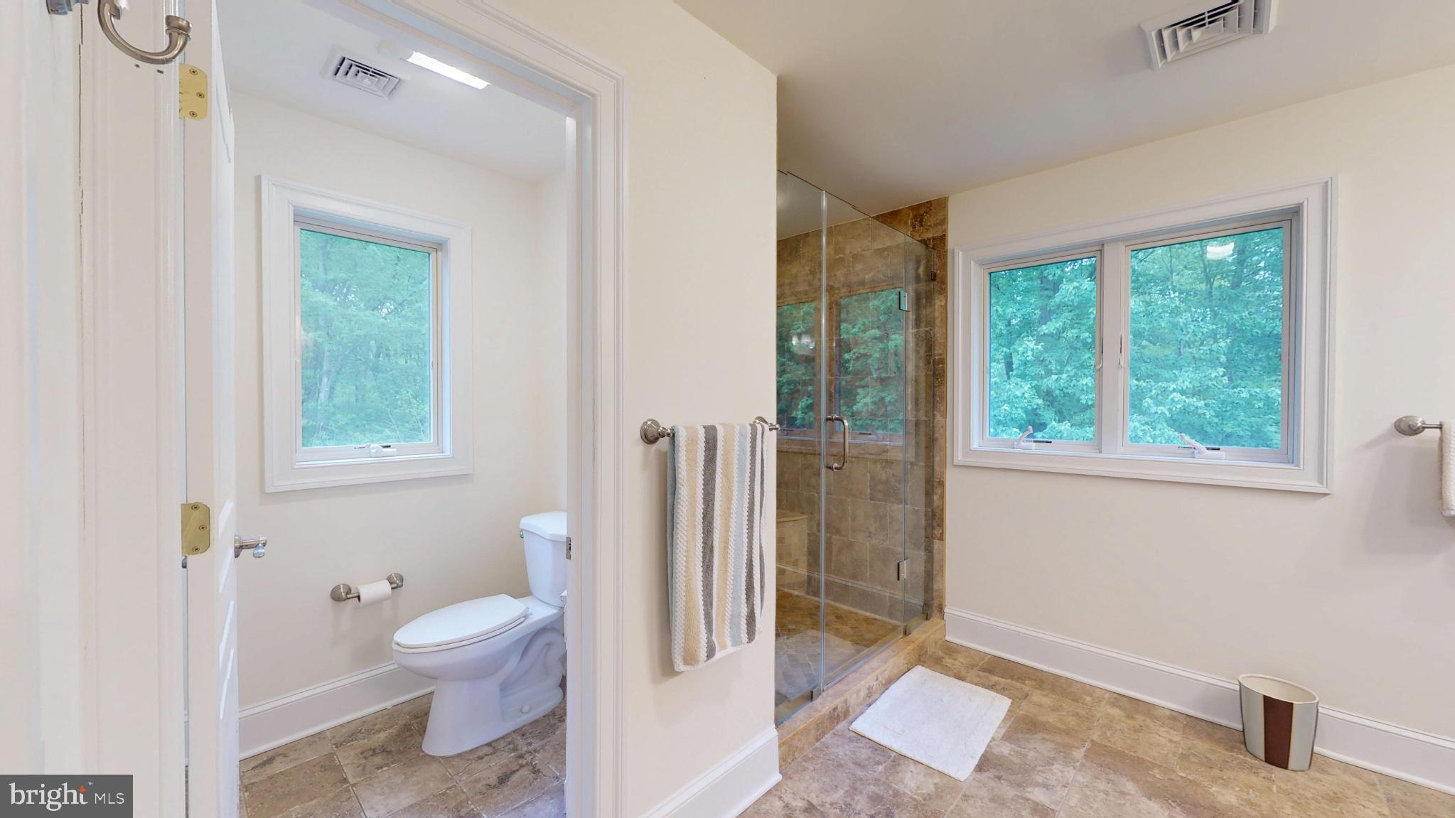 309 Ark Road Mount Laurel, NJ 08054 - Photo 34 of 60 a bathroom with a toilet sink and a shower