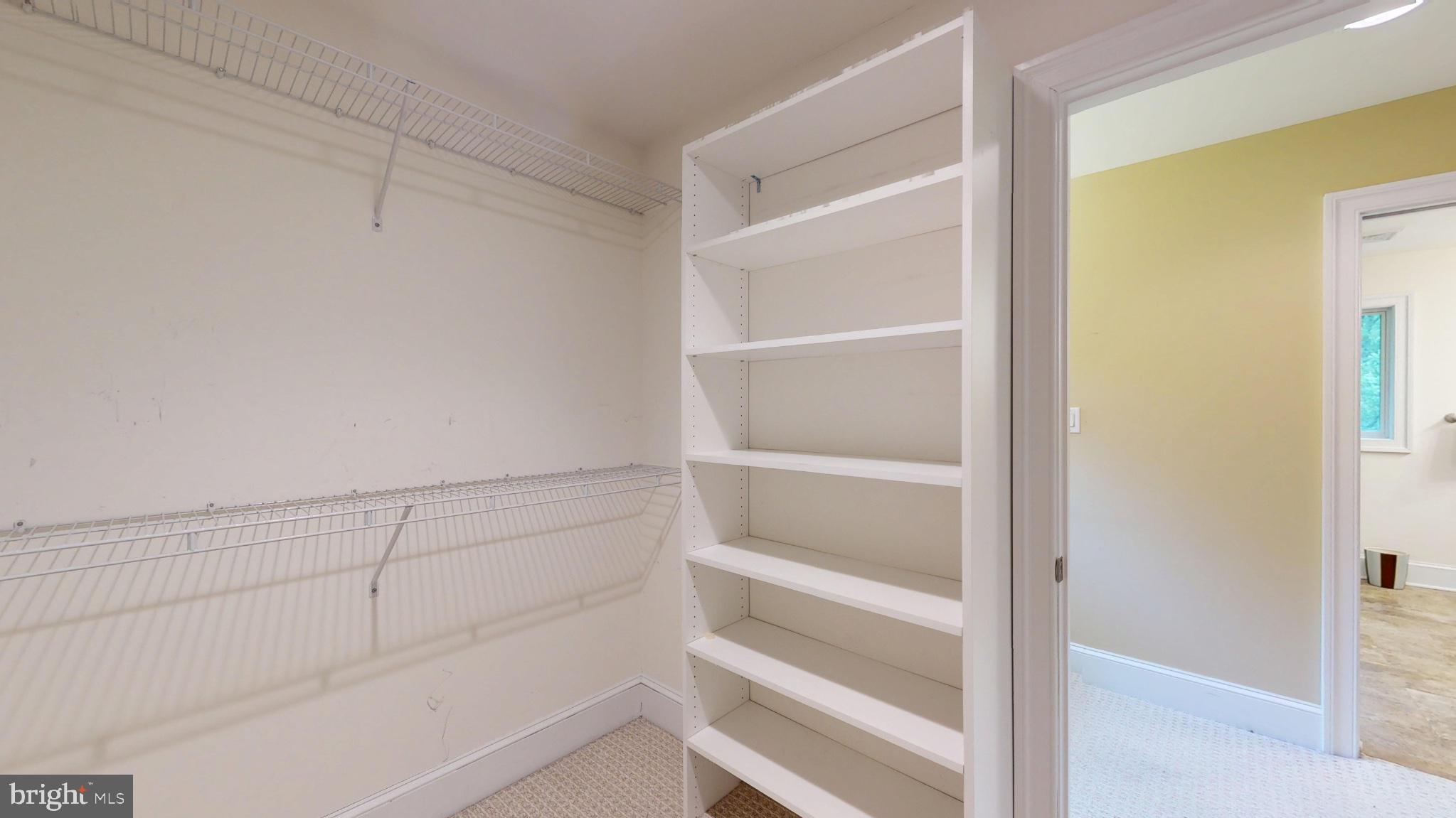 309 Ark Road Mount Laurel, NJ 08054 - Photo 35 of 60 a view of walk in closet with empty racks