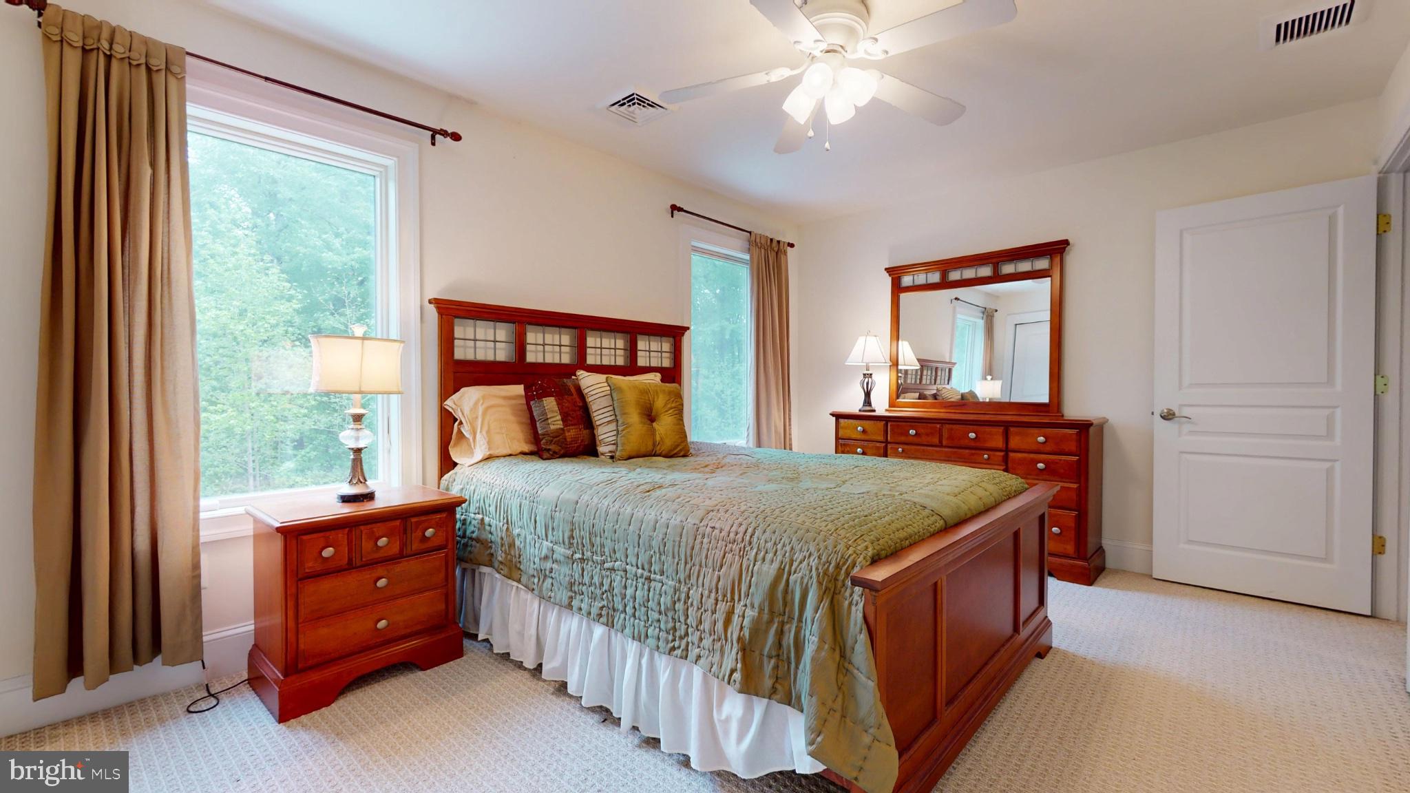 309 Ark Road Mount Laurel, NJ 08054 - Photo 38 of 60 a bedroom with a bed and a large window