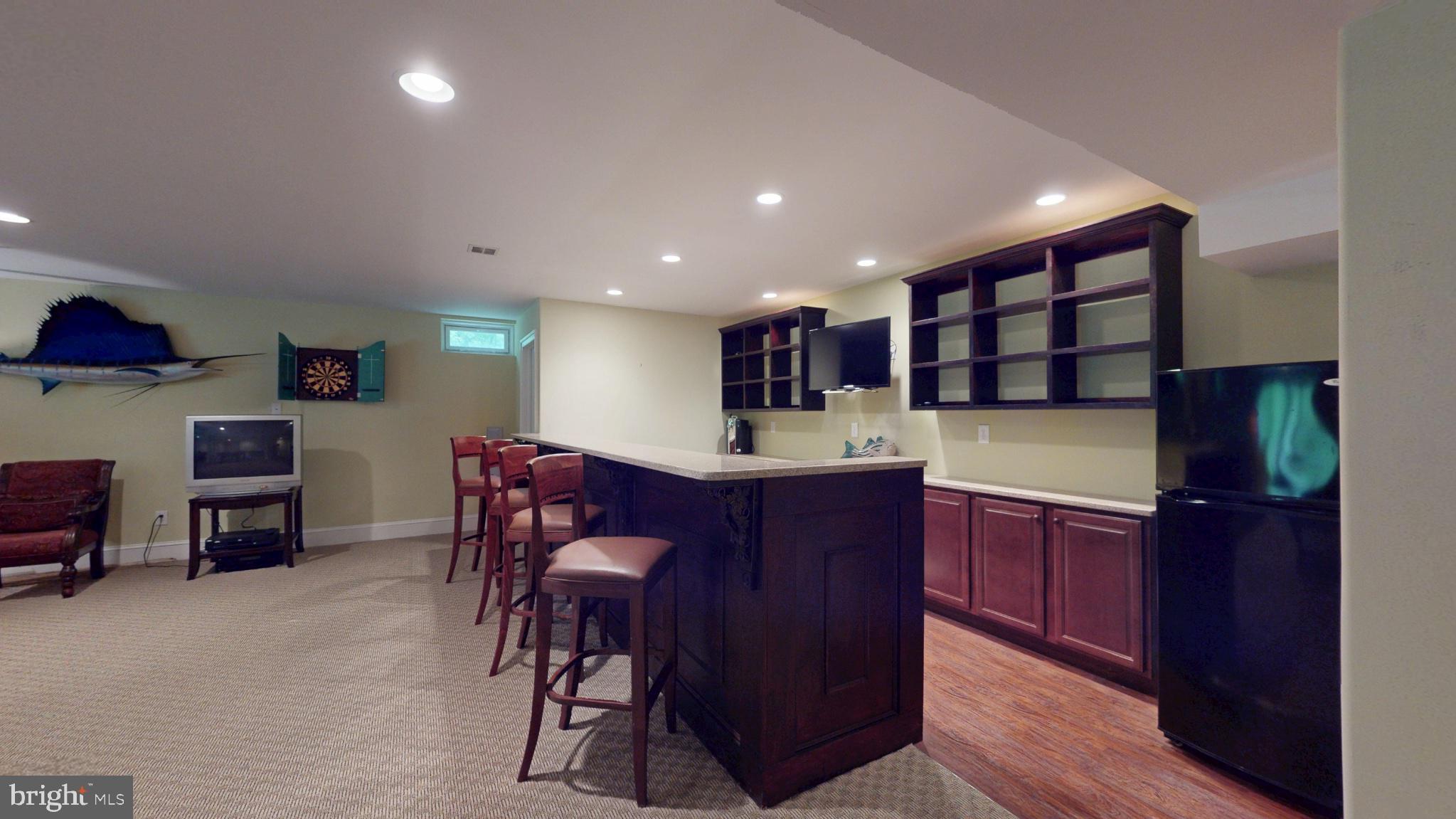 309 Ark Road Mount Laurel, NJ 08054 - Photo 45 of 60 a kitchen with stainless steel appliances granite countertop a refrigerator and a wooden cabinets