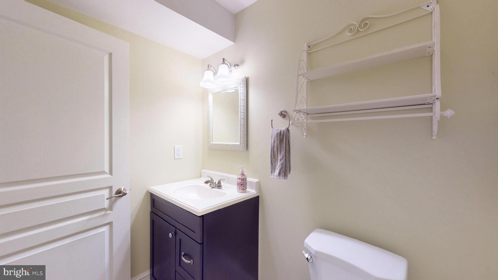 309 Ark Road Mount Laurel, NJ 08054 - Photo 52 of 60 a bathroom with a sink a toilet and shower