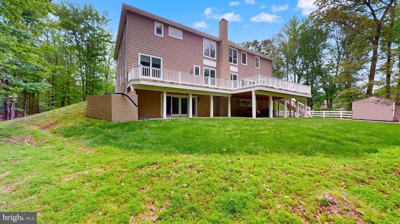 309 Ark Road Mount Laurel, NJ 08054 - Photo 56 of 60 a view of a house with a yard and sitting area