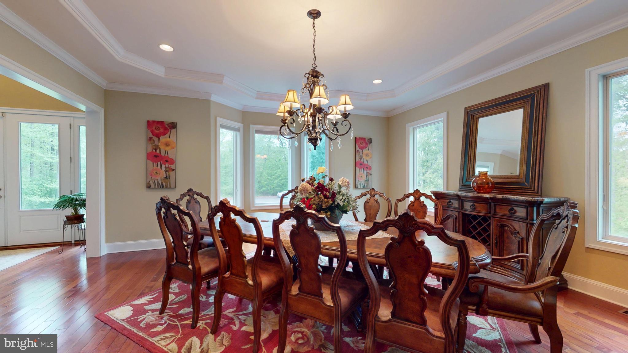 309 Ark Road Mount Laurel, NJ 08054 - Photo 8 of 60 a view of a dining room with furniture and wooden floor