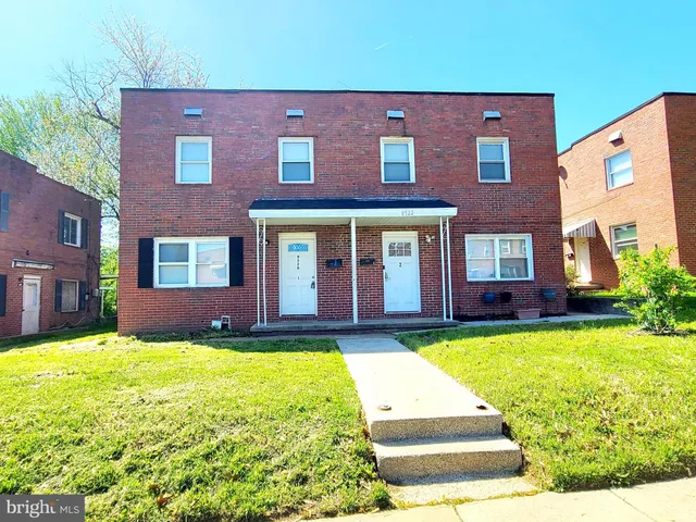 a view of a house with swimming pool
