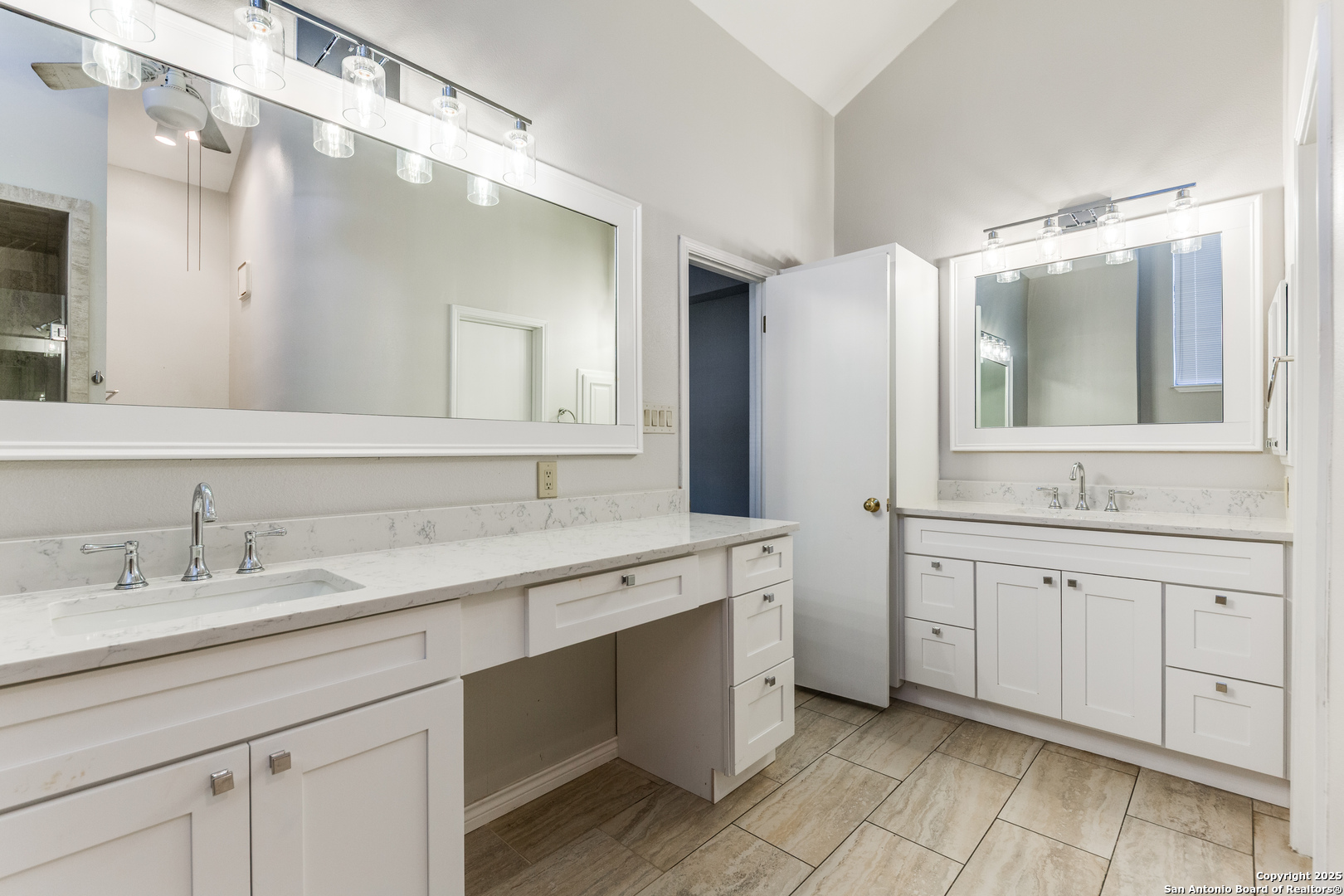 15558 Clover Ridge San Antonio, TX 78248 - Photo 20 of 29 a bathroom with a sink double vanity and a mirror