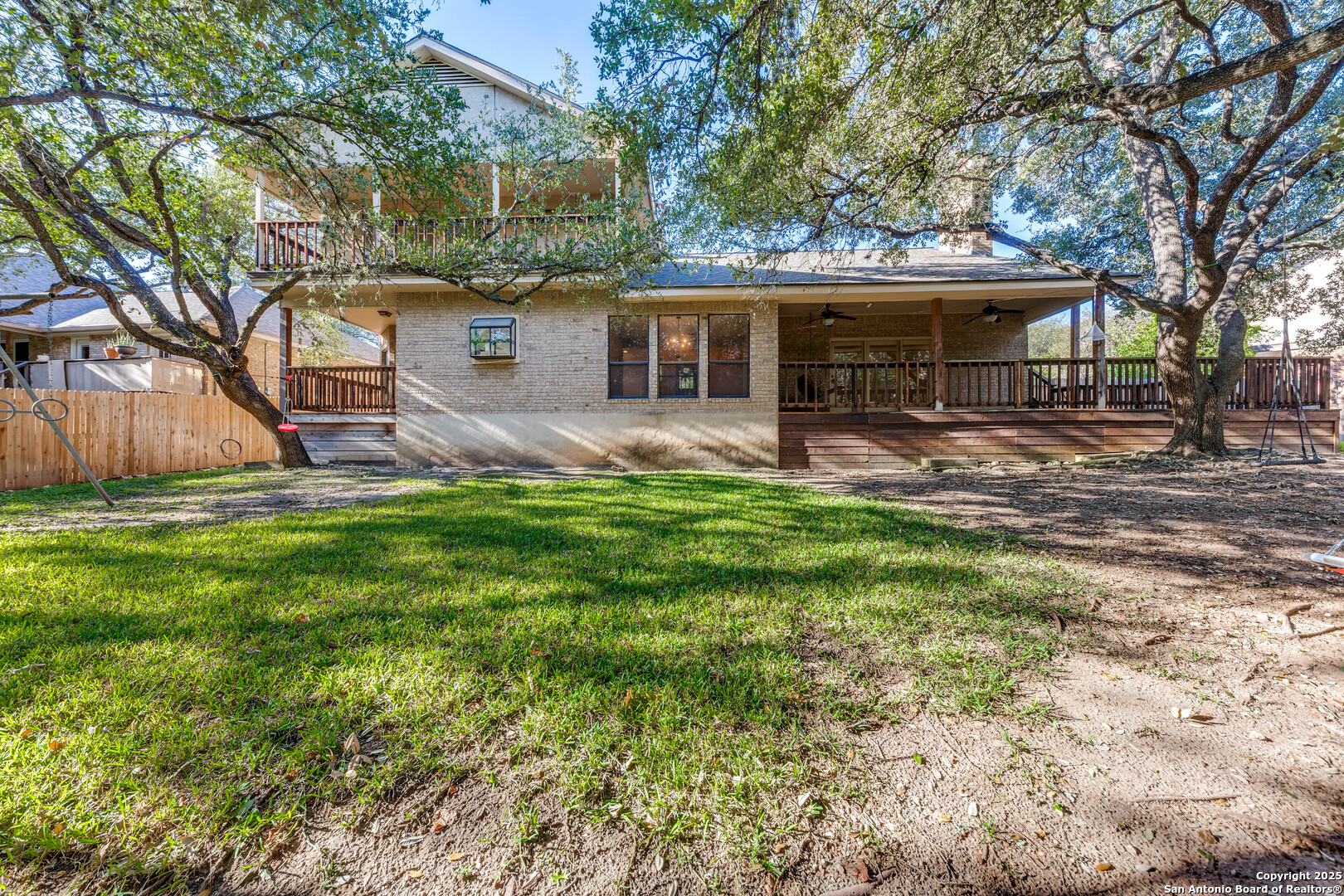 15558 Clover Ridge San Antonio, TX 78248 - Photo 25 of 29 front view of a house with a yard