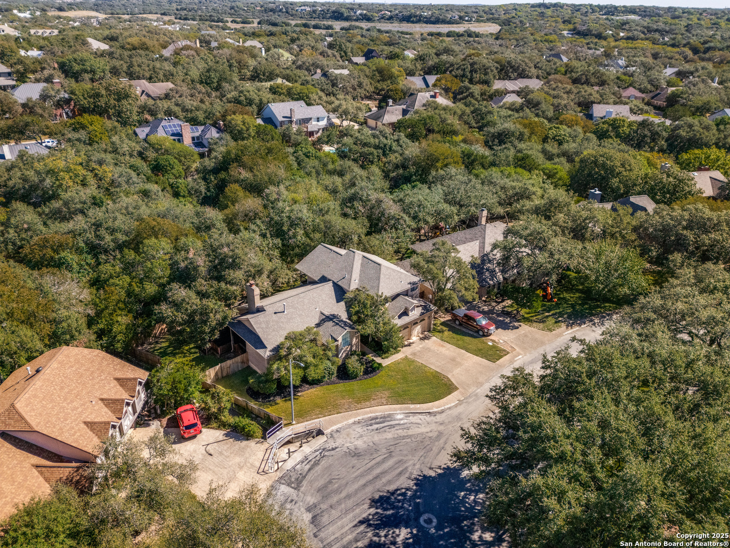 15558 Clover Ridge San Antonio, TX 78248 - Photo 28 of 29 an aerial view of residential houses with outdoor space