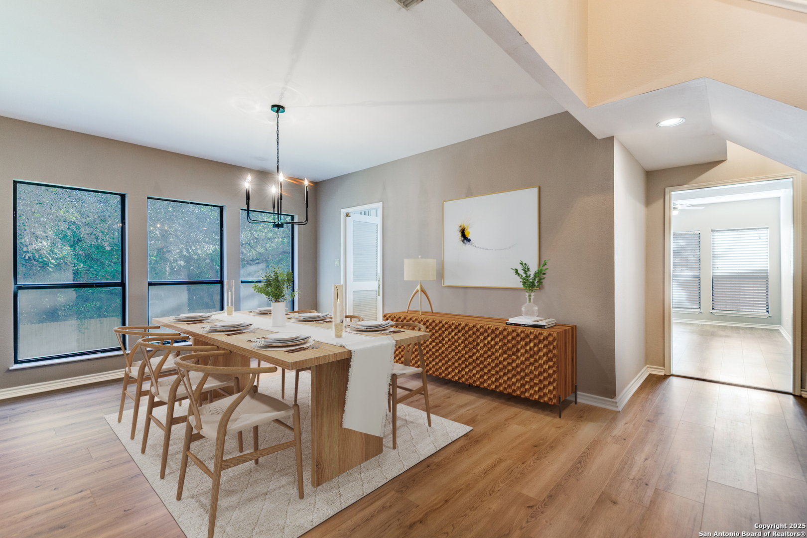 15558 Clover Ridge San Antonio, TX 78248 - Photo 8 of 29 a view of a dining room with furniture window and wooden floor