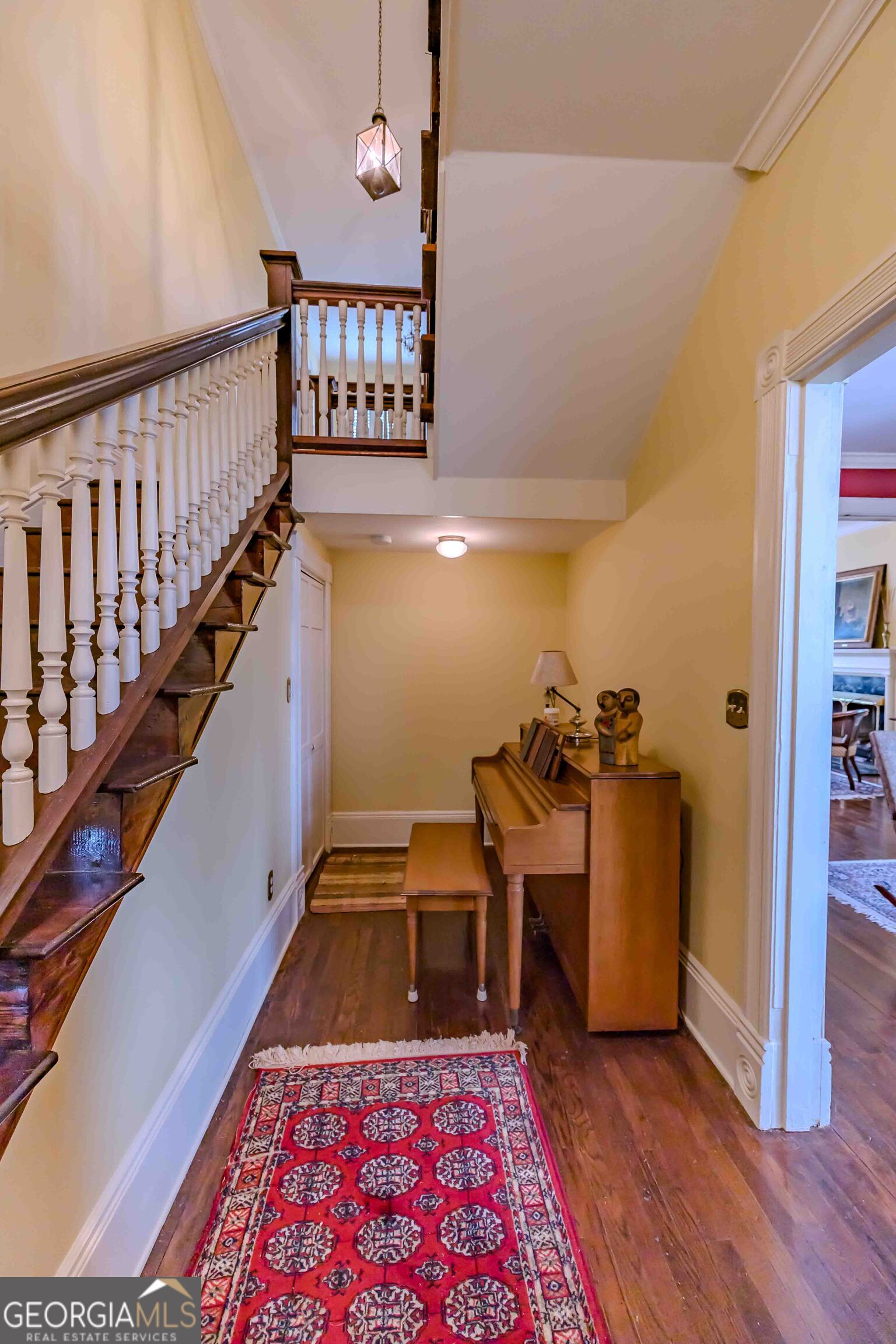 39 West Graham Street McRae-Helena, GA 31055 - Photo 19 of 107 a view of a hallway with workspace and wooden floor