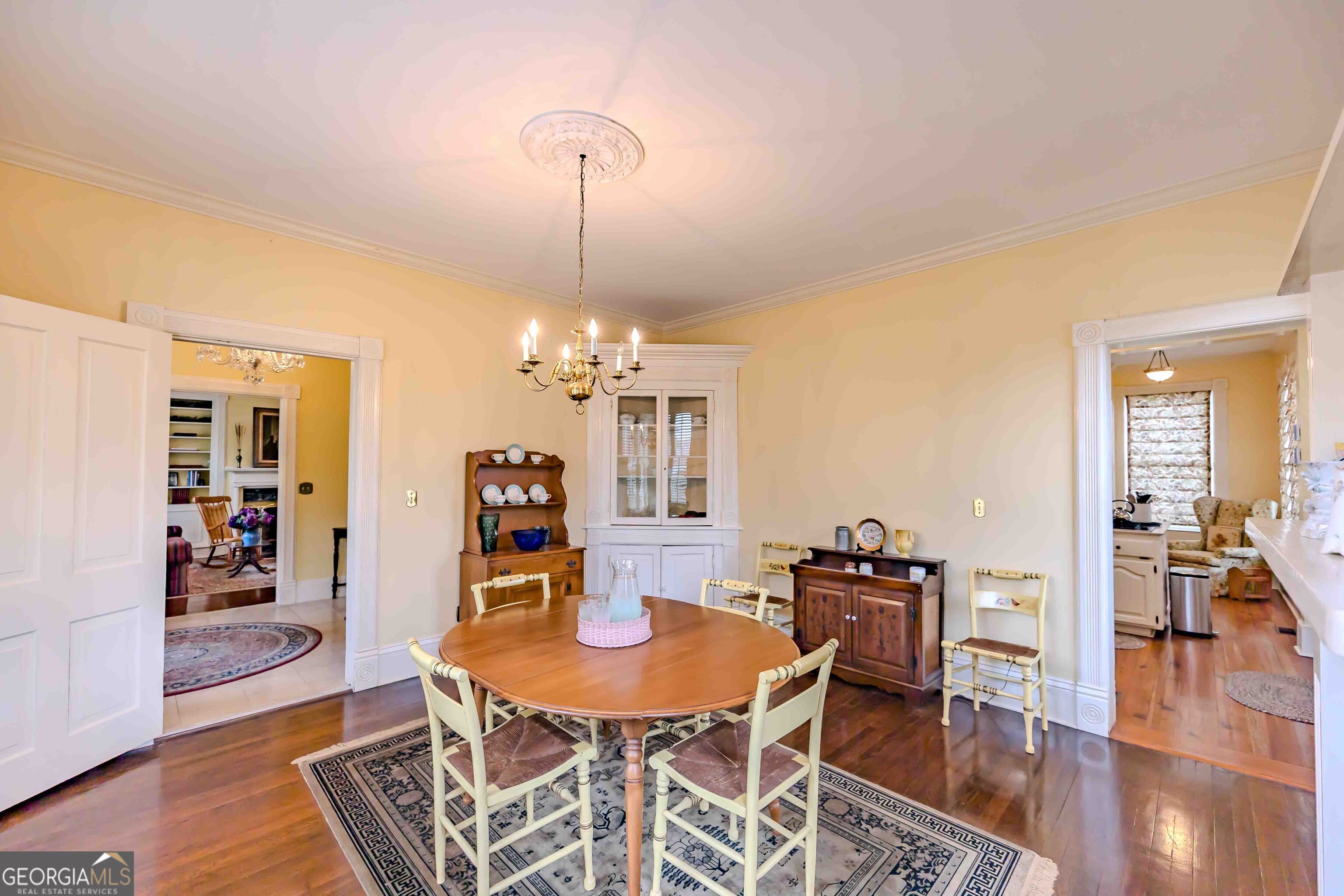 39 West Graham Street McRae-Helena, GA 31055 - Photo 37 of 107 a view of a dining room with furniture and wooden floor