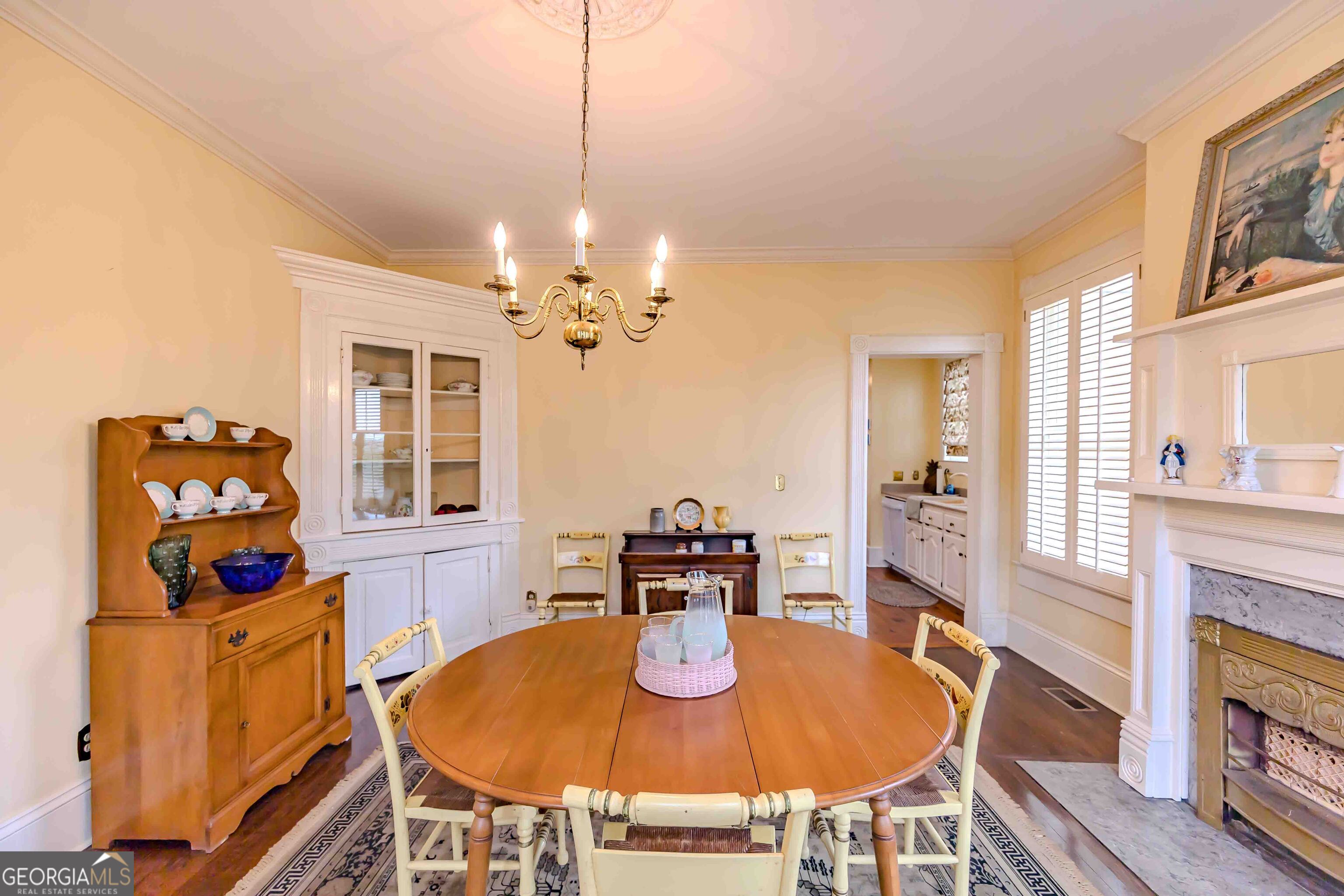 39 West Graham Street McRae-Helena, GA 31055 - Photo 38 of 107 a view of a dining room with furniture and chandelier