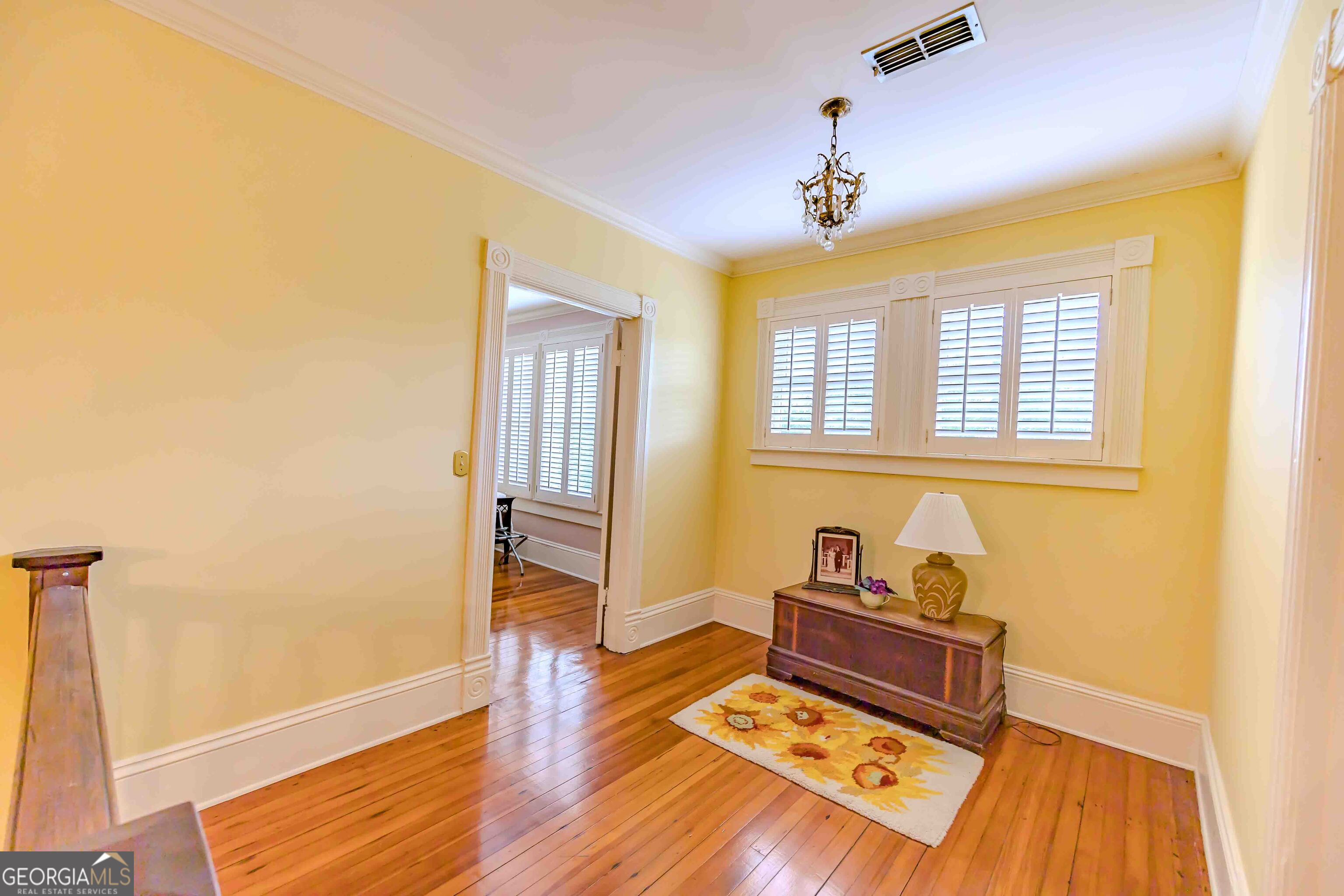 39 West Graham Street McRae-Helena, GA 31055 - Photo 43 of 107 a living room with furniture and a wooden floor