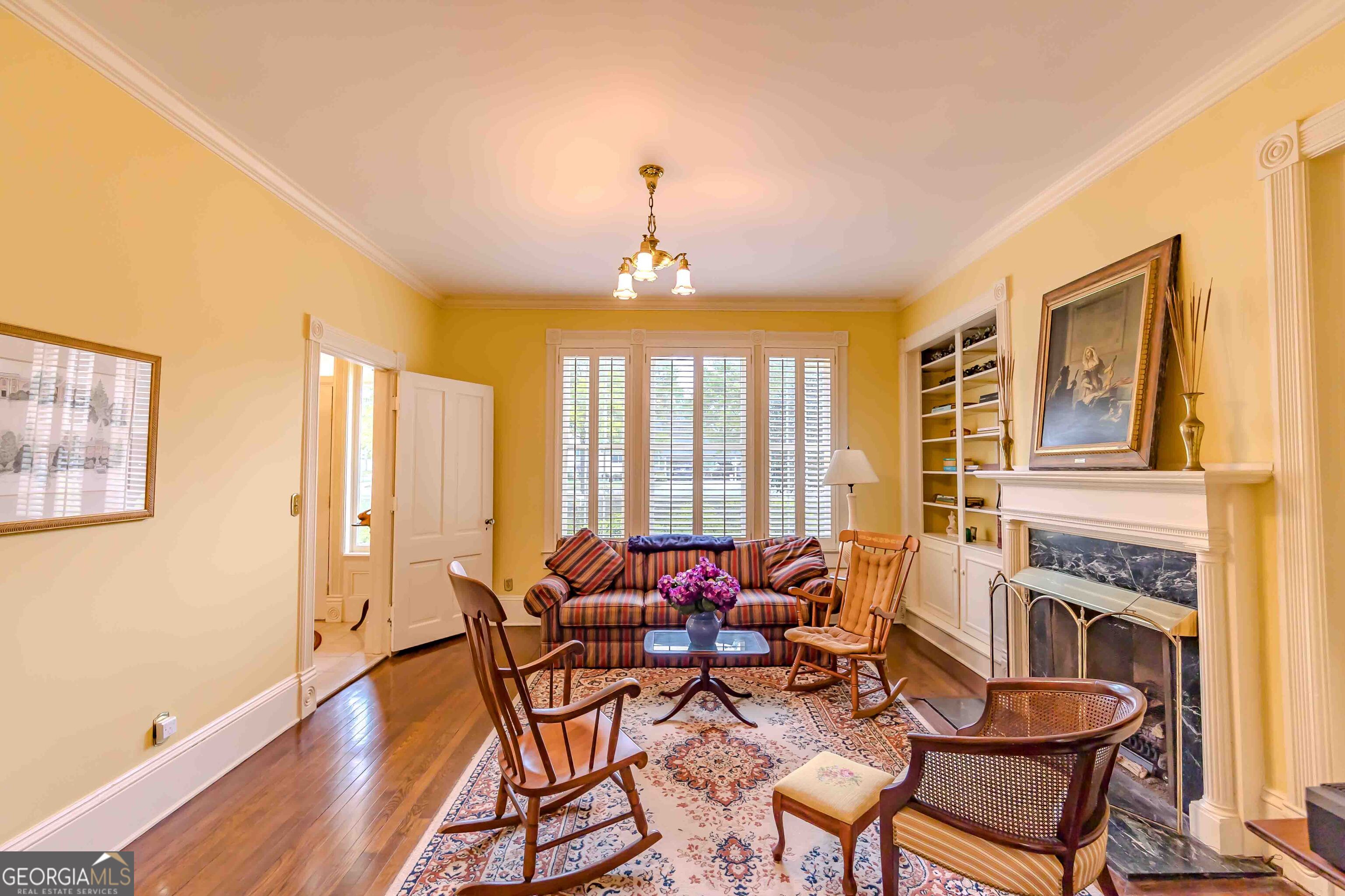 39 West Graham Street McRae-Helena, GA 31055 - Photo 10 of 107 a dining room with furniture a chandelier and wooden floor