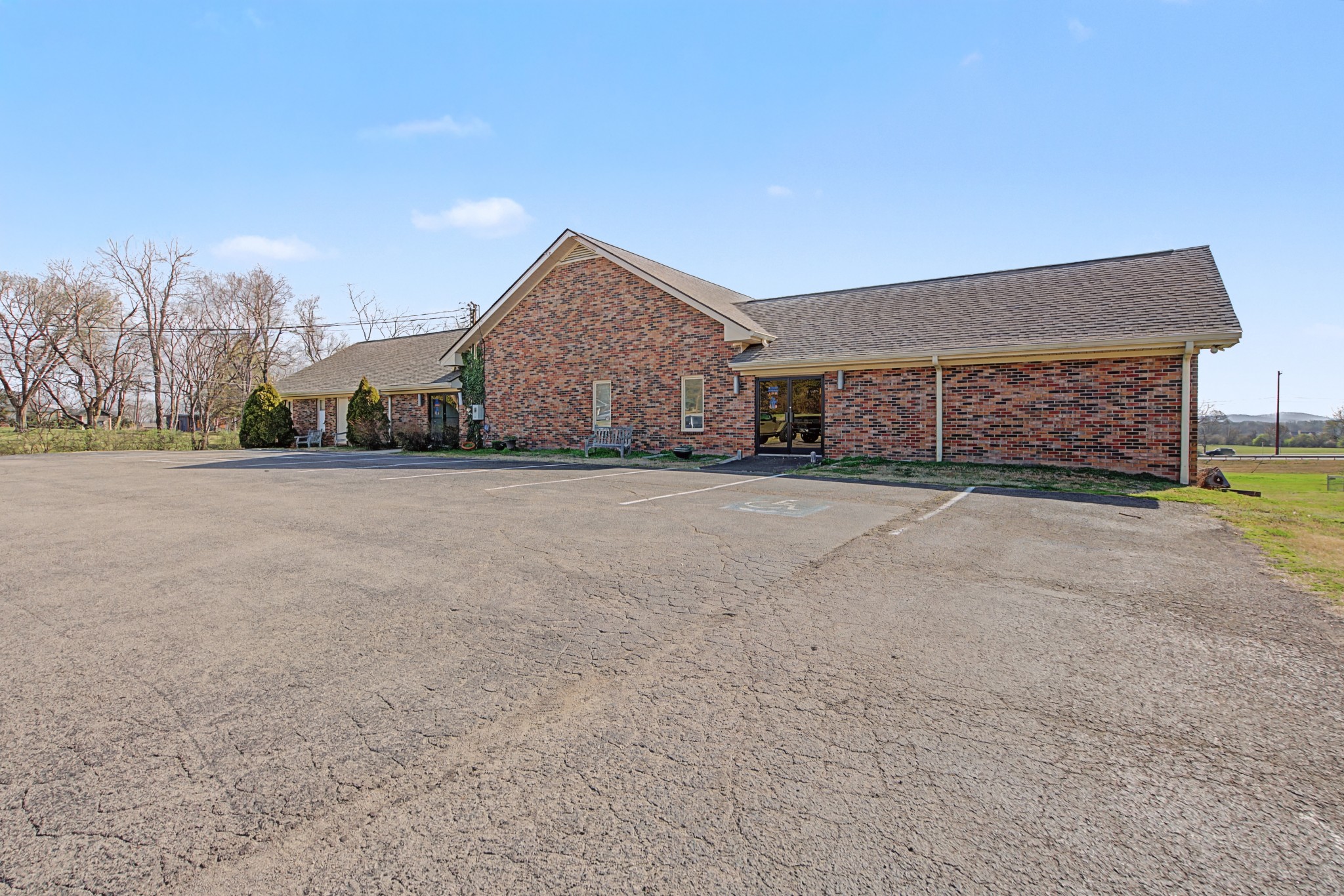 1301 Franklin Road Brentwood, TN 37027 - Photo 7 of 15 a view of a house with a yard and garage