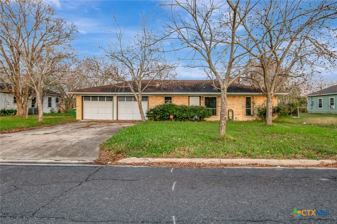 front view of house with a yard