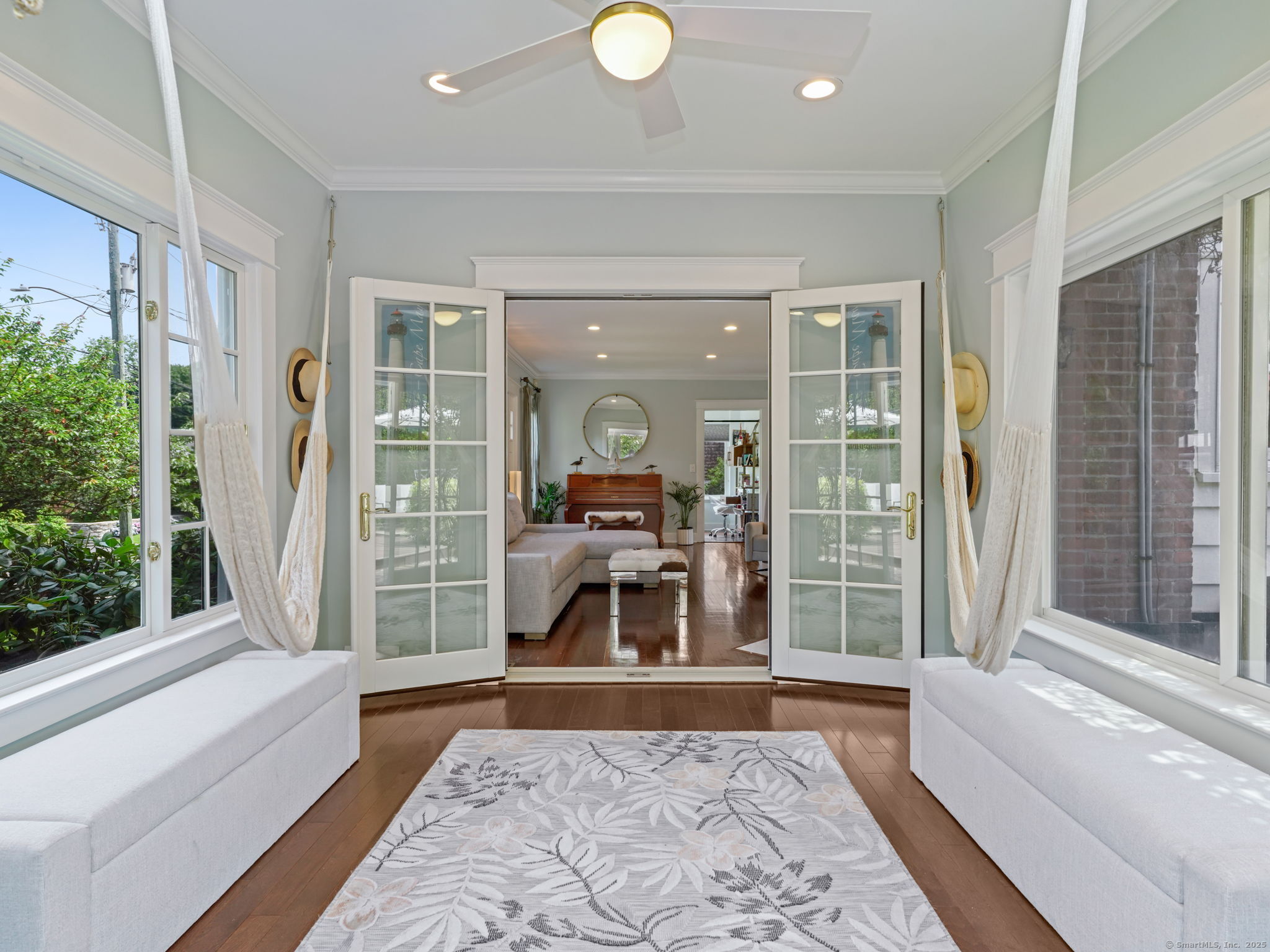 23 Auldwood Road Stamford, CT 06902 - Photo 5 of 39 sun room off of the living room....complete with hammocks!