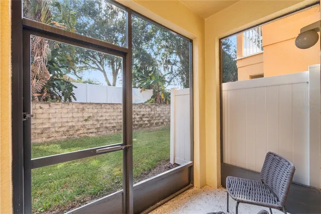 a view of a room with a large window