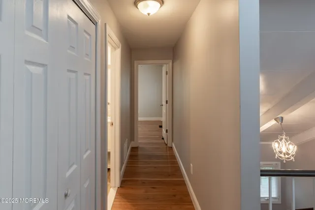 a view of a hallway with front door