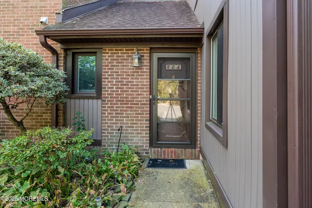 a front view of a house with a porch