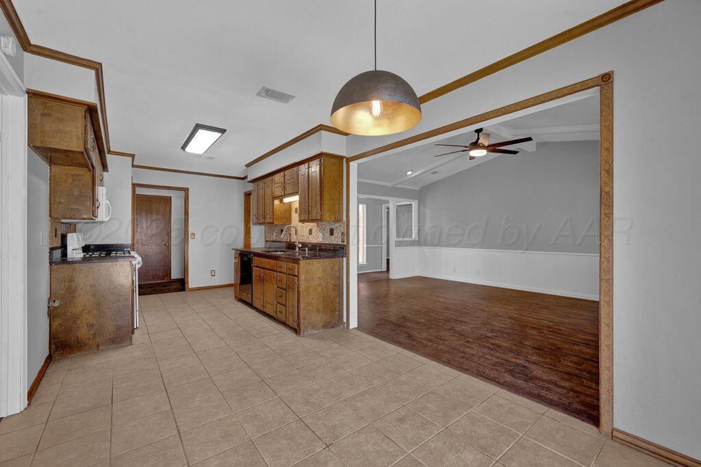 7935 Mitcham Drive Amarillo, TX 79121 - Photo 20 of 20 a view of living room and kitchen