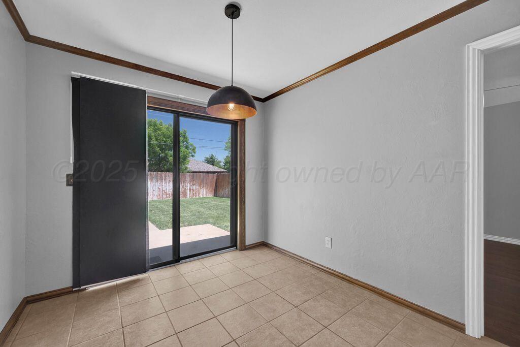 7935 Mitcham Drive Amarillo, TX 79121 - Photo 9 of 20 a view of a room with a large window