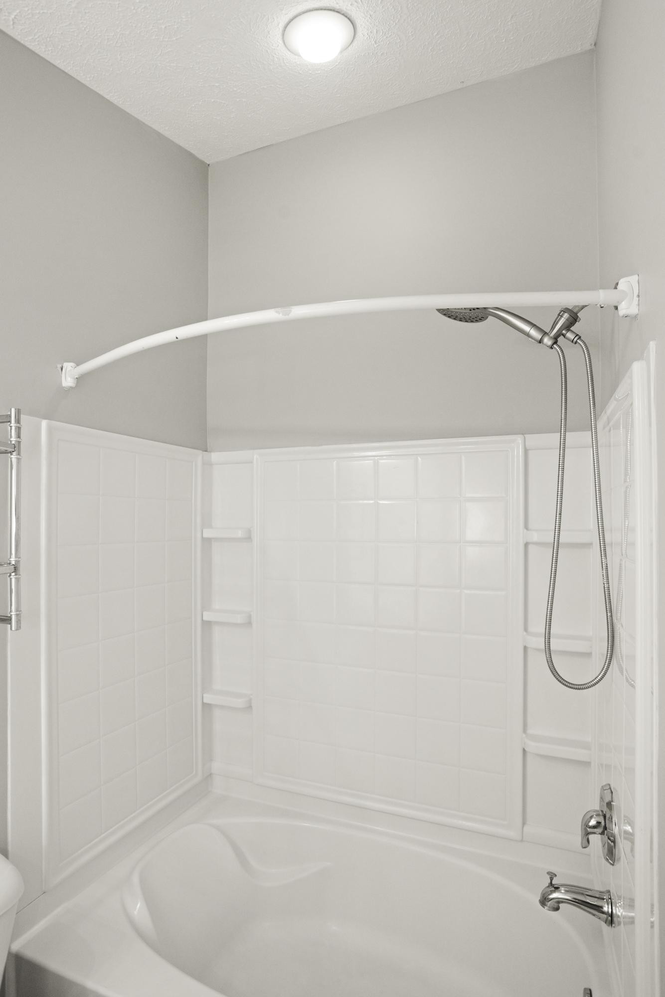 7277 Charlotte Pike, Unit 227 Nashville, TN 37209 - Photo 24 of 36 a bathroom with a shower