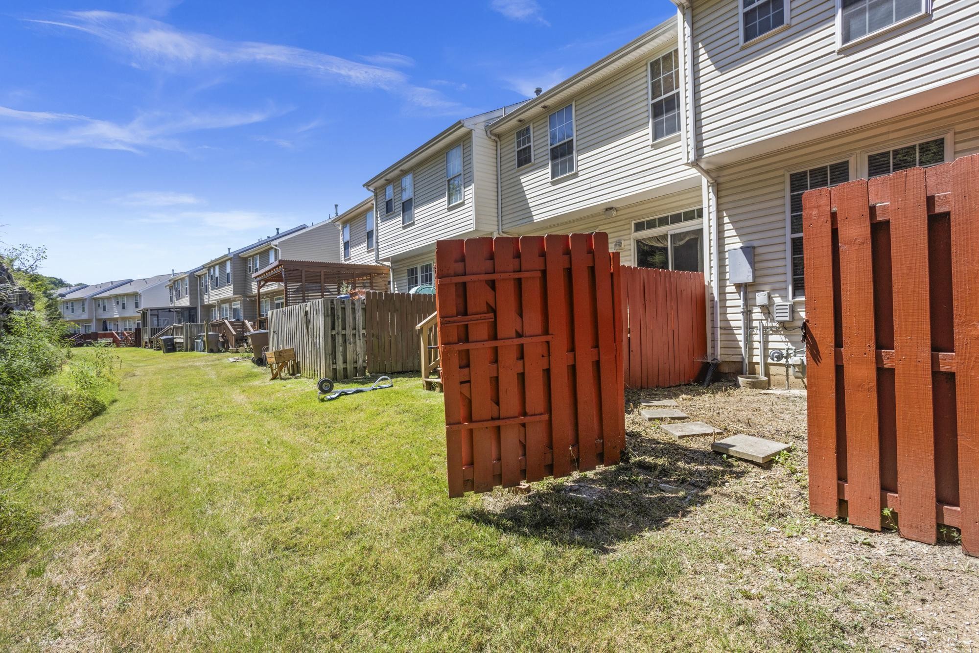 7277 Charlotte Pike, Unit 227 Nashville, TN 37209 - Photo 34 of 36 a view of a house with a yard