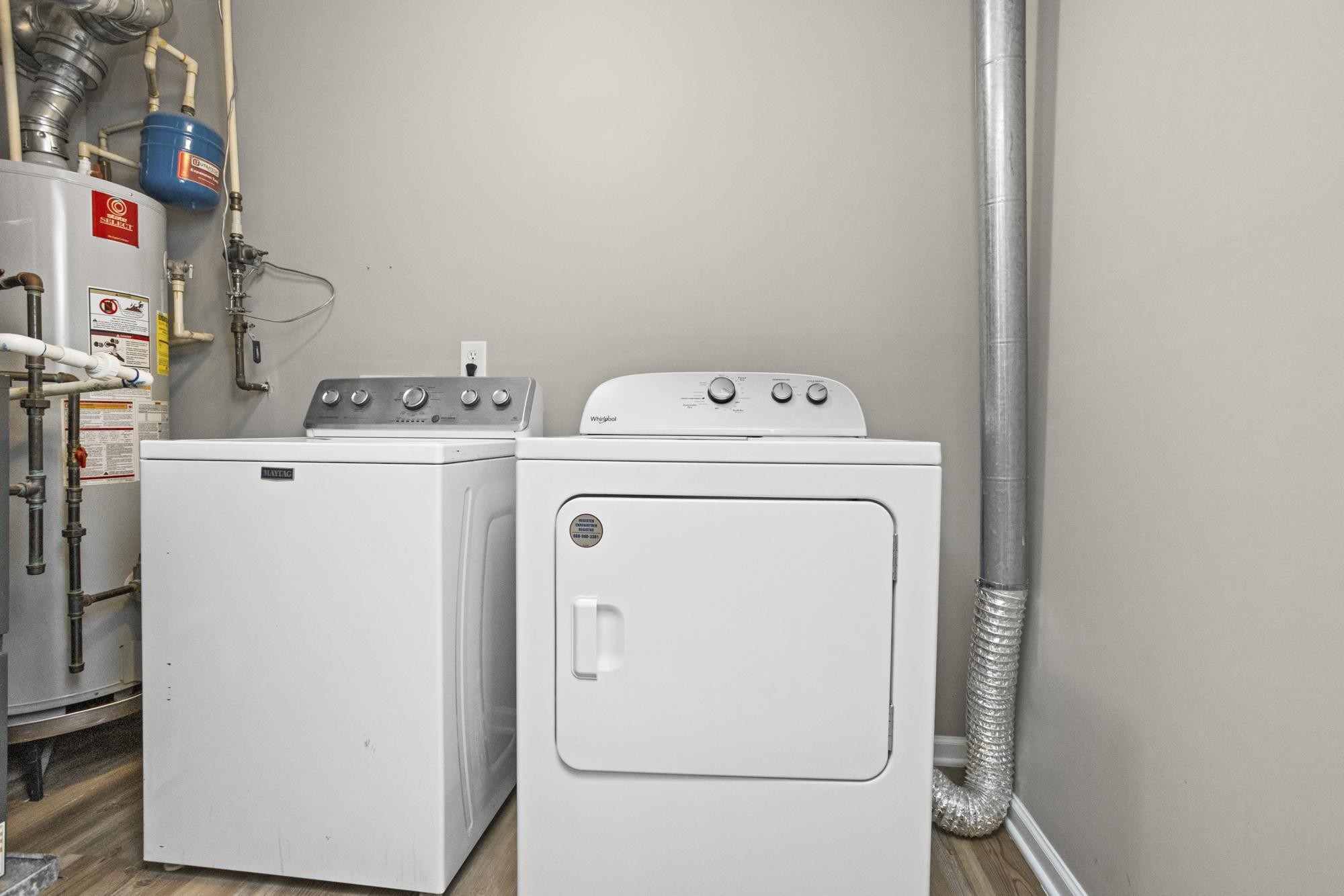 7277 Charlotte Pike, Unit 227 Nashville, TN 37209 - Photo 7 of 36 a utility room with dryer and washer