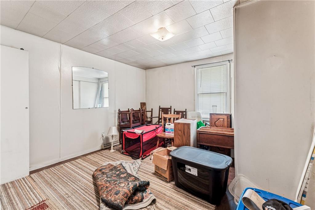 1110 Ross Mountain Park Road New Florence, PA 15944 - Photo 9 of 24 a living room with furniture a rug and a window