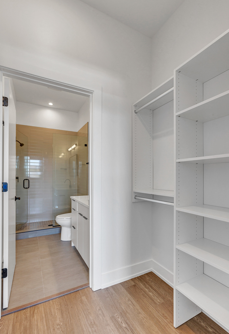 3312 North Halsted Street, Unit 2F Chicago, IL 60657 - Photo 11 of 17 a bathroom with a sink and a toilet