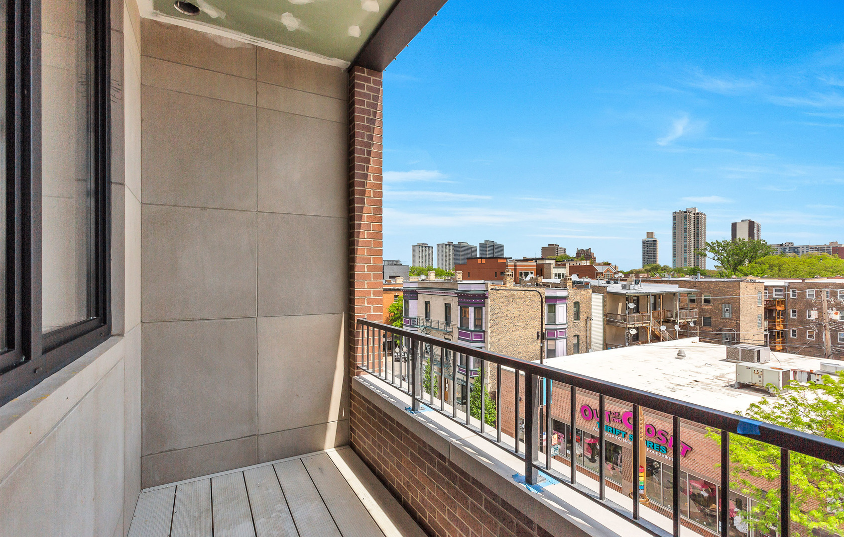 3312 North Halsted Street, Unit 2F Chicago, IL 60657 - Photo 13 of 17 a balcony with city view