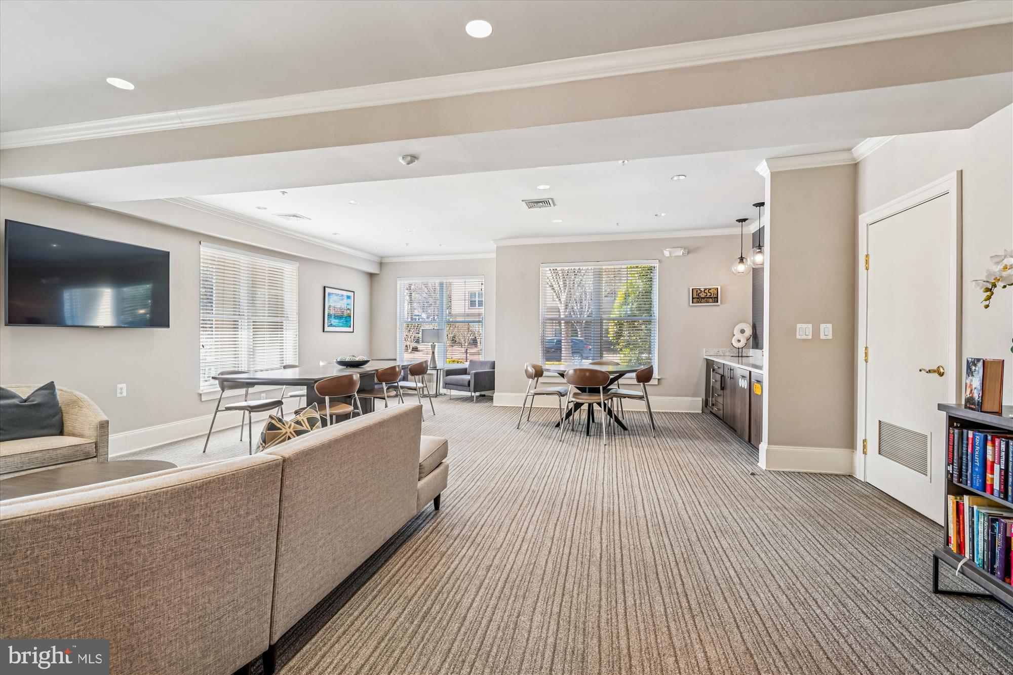 11750 Old Georgetown Road, Unit 2313 Rockville, MD 20852 - Photo 11 of 59 a living room with furniture and a flat screen tv
