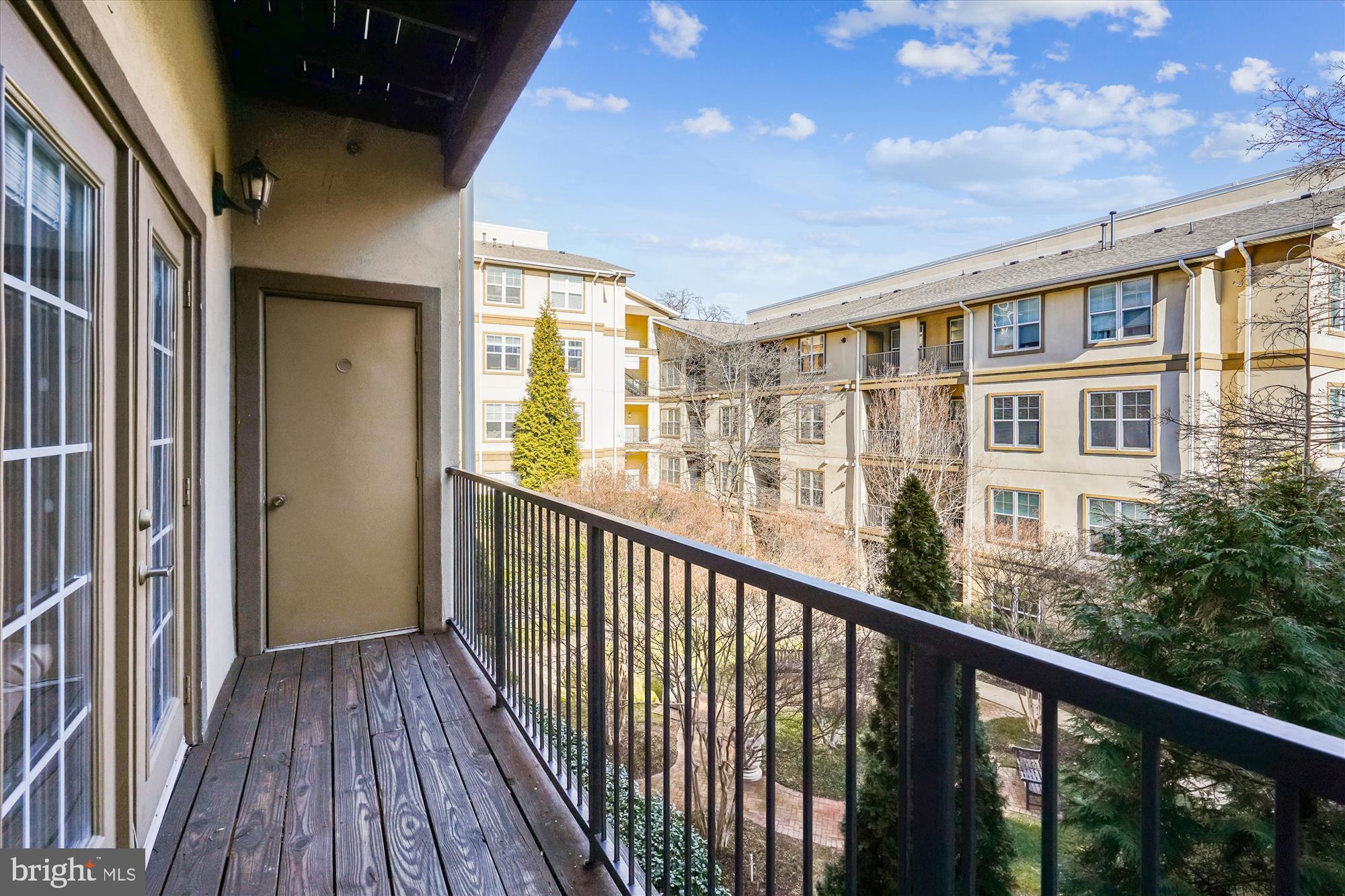 11750 Old Georgetown Road, Unit 2313 Rockville, MD 20852 - Photo 23 of 59 a view of balcony with wooden floor