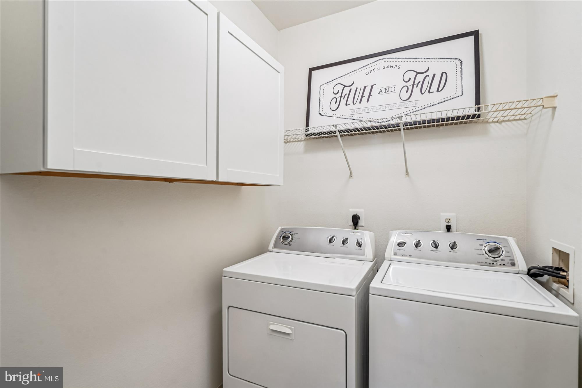 11750 Old Georgetown Road, Unit 2313 Rockville, MD 20852 - Photo 25 of 59 a utility room with dryer and washer