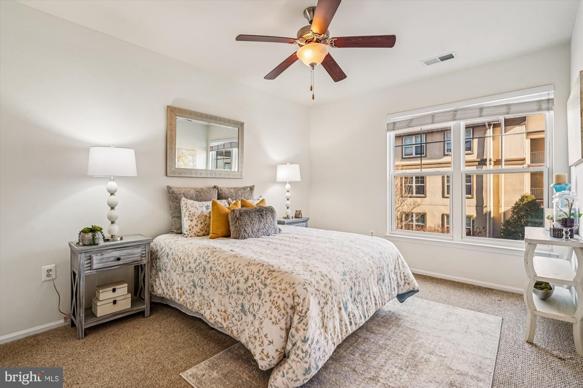 11750 Old Georgetown Road, Unit 2313 Rockville, MD 20852 - Photo 27 of 59 a bedroom with a bed and a window