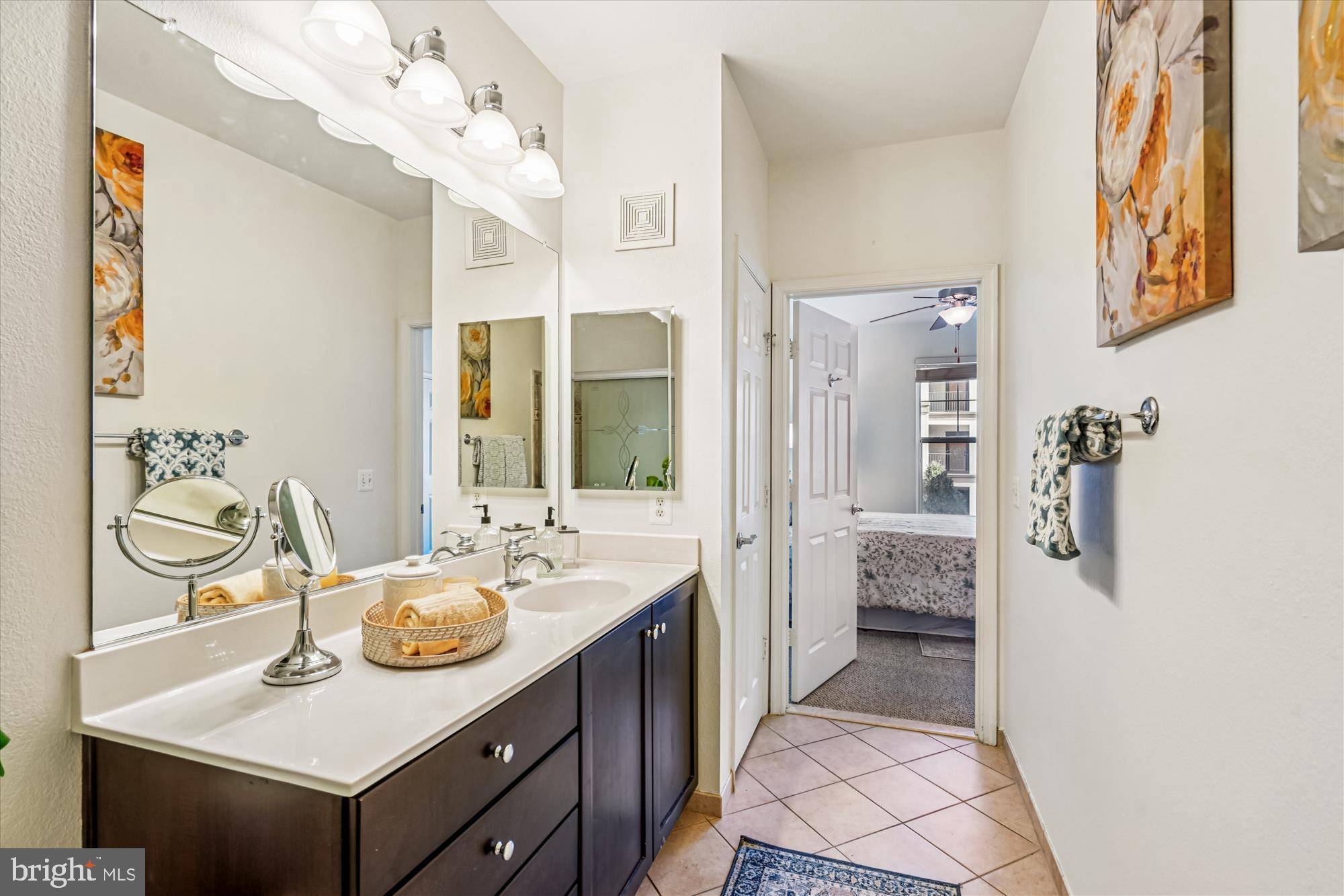 11750 Old Georgetown Road, Unit 2313 Rockville, MD 20852 - Photo 30 of 59 a spacious bathroom with a sink double vanity granite and a shower