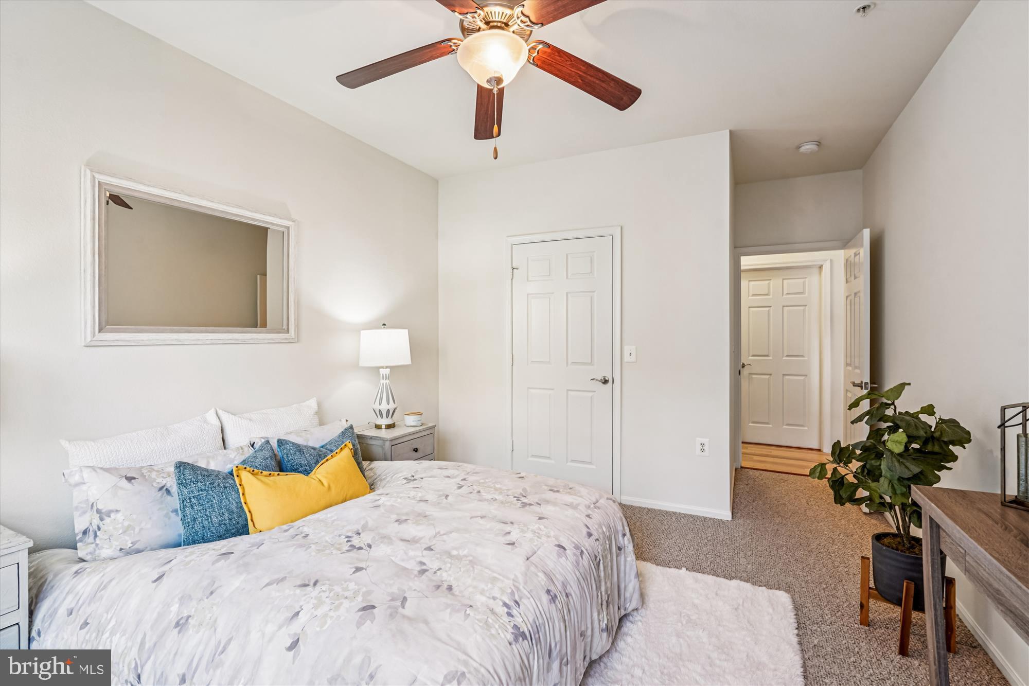 11750 Old Georgetown Road, Unit 2313 Rockville, MD 20852 - Photo 33 of 59 a bedroom with a bed chandelier and a window