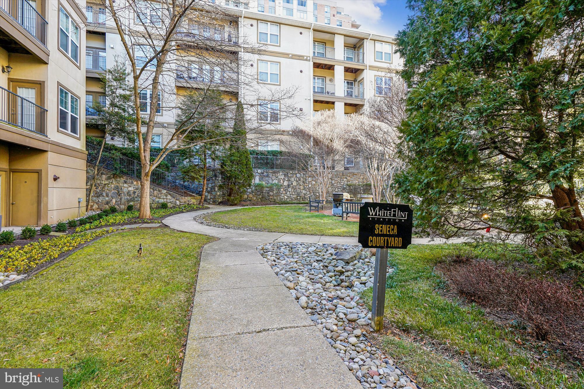 11750 Old Georgetown Road, Unit 2313 Rockville, MD 20852 - Photo 41 of 59 a view of a swimming pool with a yard