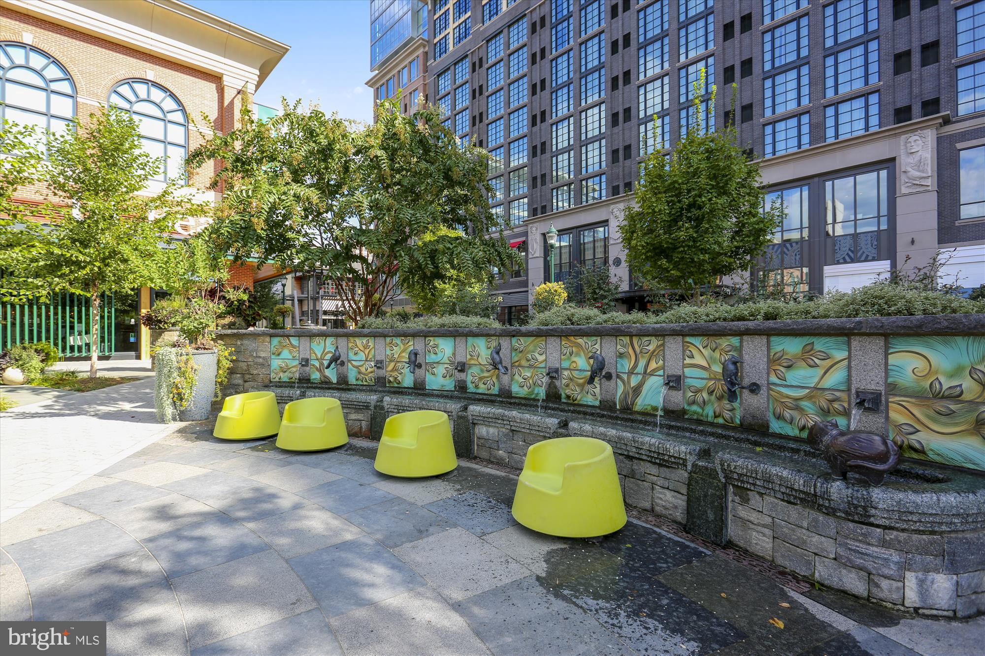 11750 Old Georgetown Road, Unit 2313 Rockville, MD 20852 - Photo 55 of 59 a view of a swimming pool with a patio and a garden